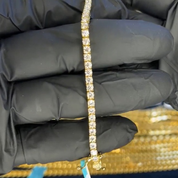 8in 14kt gold over 925 sterling silver tennis bracelet